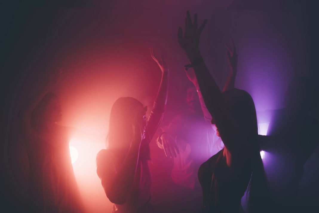 dancing-people-in-club-scaled
